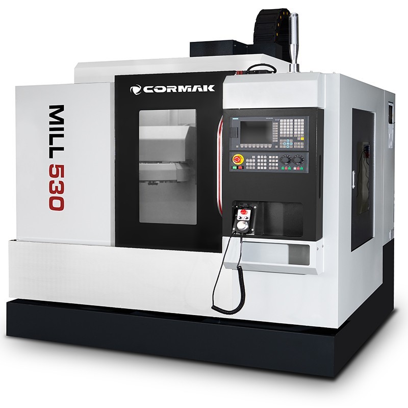 What is a CNC machining centre, and how does it differ from a CNC milling machine?