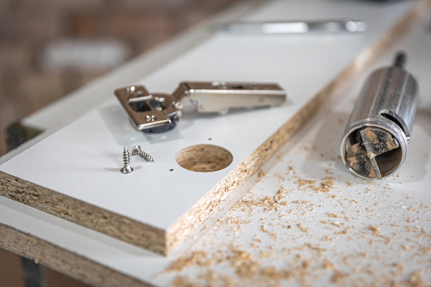 Drilling holes for concealed cabinet hinges